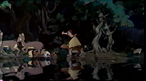 Great attention to detail is paid towards replicating realistic lighting effects. Snow White emerges from the shadow of a tree, and the reflections of all the animals can be seen on the water.